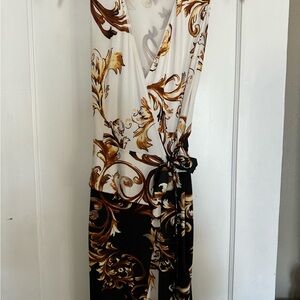 Classy Joseph Ribkoff wrap dress. Black, yellow, cream. Size 2. Peplum waist.